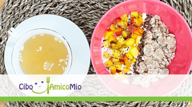 Yogurt magro con frutta, cereali, semi e erbe accompagnato da infuso a base di zenzero, limone e cannella